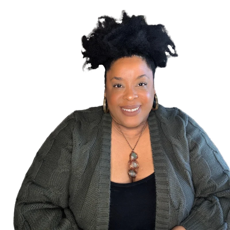 Ivy Felicia, creator of the Body Relationship® Method, smiling in a green cable-knit cardigan